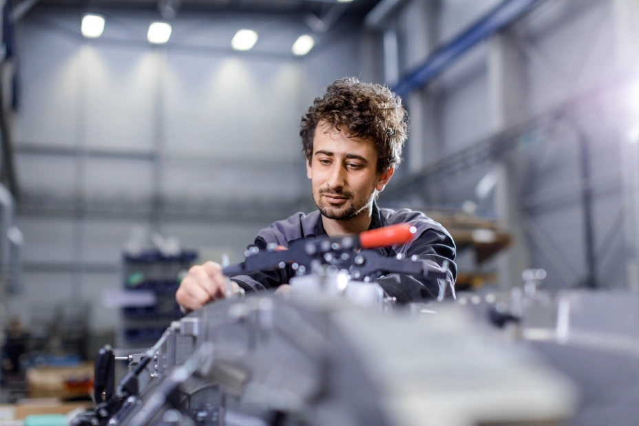 TIYO technician works on the production of testing equipment